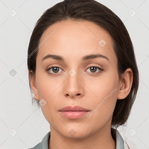 Neutral white young-adult female with medium  brown hair and brown eyes