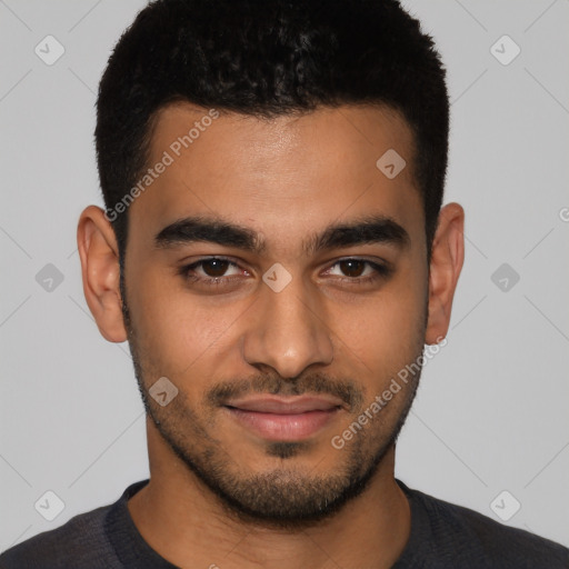 Joyful latino young-adult male with short  black hair and brown eyes