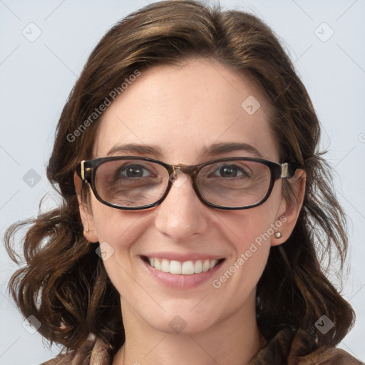 Joyful white young-adult female with medium  brown hair and blue eyes