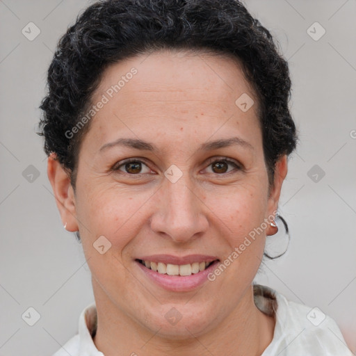 Joyful white adult female with short  brown hair and brown eyes