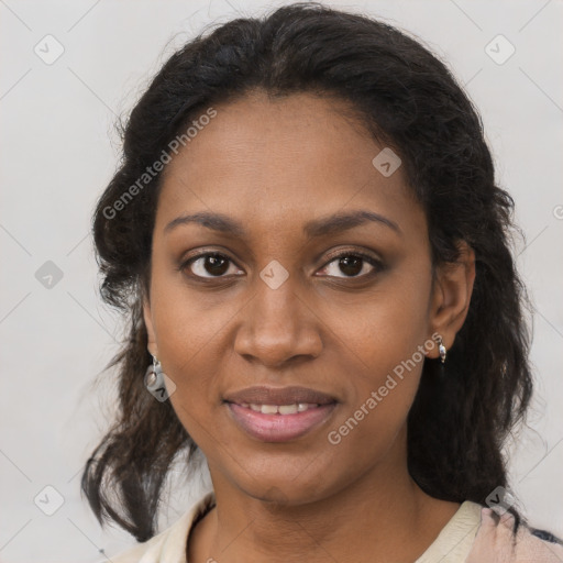 Joyful black young-adult female with medium  brown hair and brown eyes