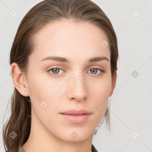 Neutral white young-adult female with medium  brown hair and grey eyes