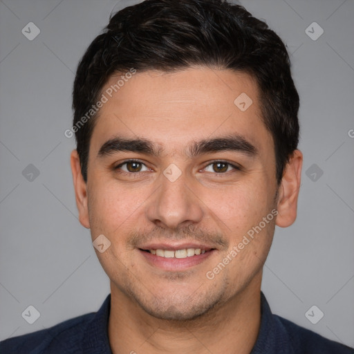 Joyful white young-adult male with short  black hair and brown eyes