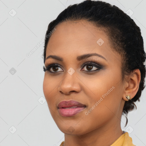 Joyful latino young-adult female with short  black hair and brown eyes