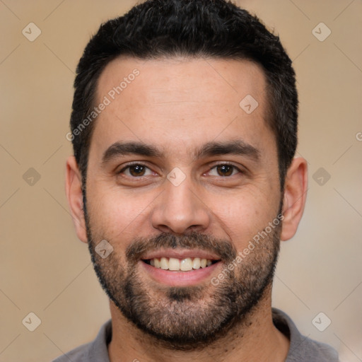 Joyful white young-adult male with short  black hair and brown eyes