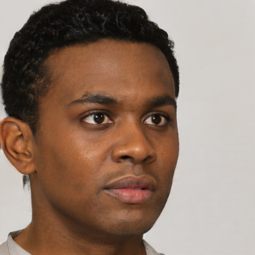 Neutral black young-adult male with short  brown hair and brown eyes