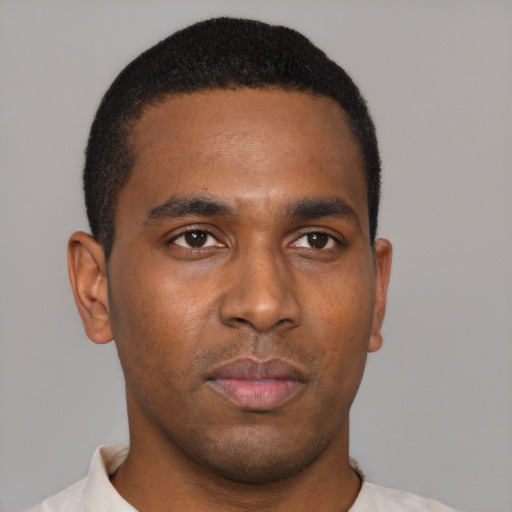 Neutral black young-adult male with short  brown hair and brown eyes
