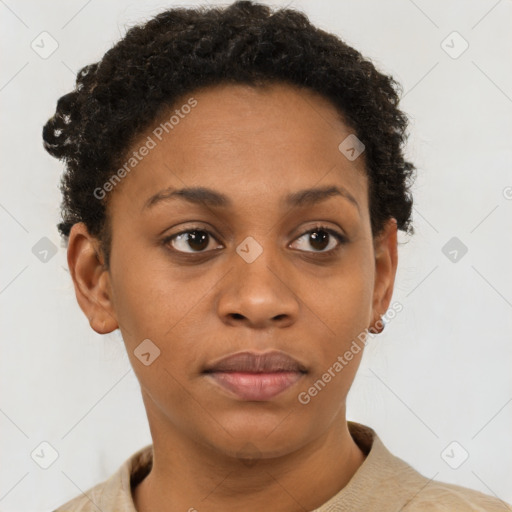 Joyful black young-adult female with short  brown hair and brown eyes