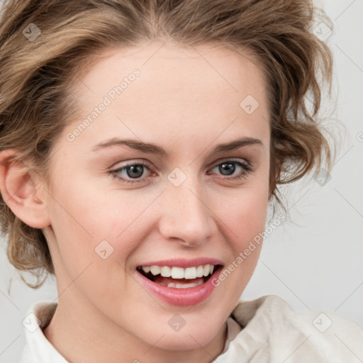 Joyful white young-adult female with medium  brown hair and blue eyes