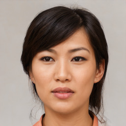 Neutral asian young-adult female with medium  brown hair and brown eyes