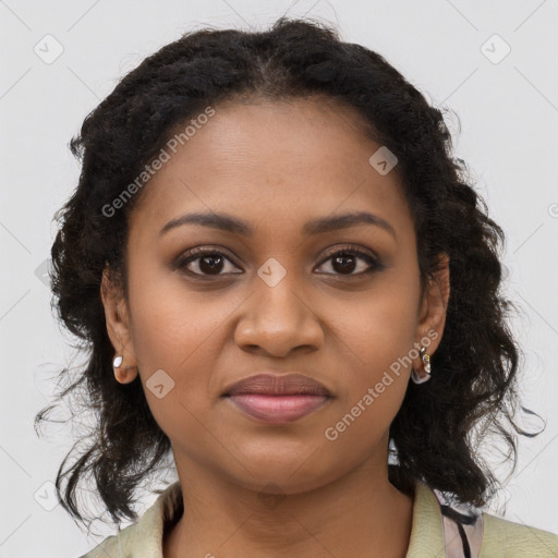 Joyful black young-adult female with long  brown hair and brown eyes