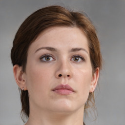 Neutral white young-adult female with medium  brown hair and brown eyes