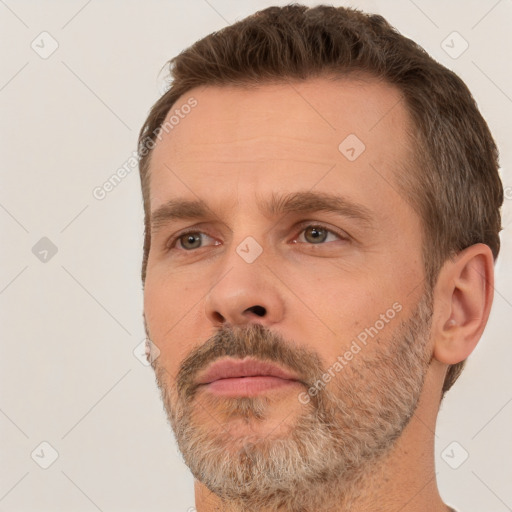 Neutral white adult male with short  brown hair and brown eyes