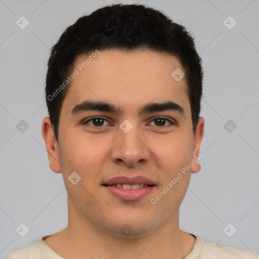 Joyful latino young-adult male with short  brown hair and brown eyes