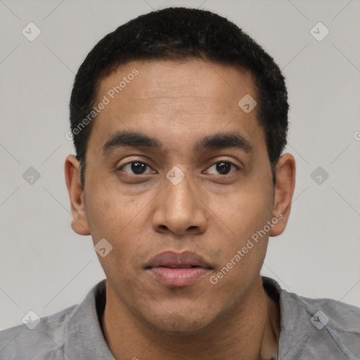 Neutral latino young-adult male with short  black hair and brown eyes