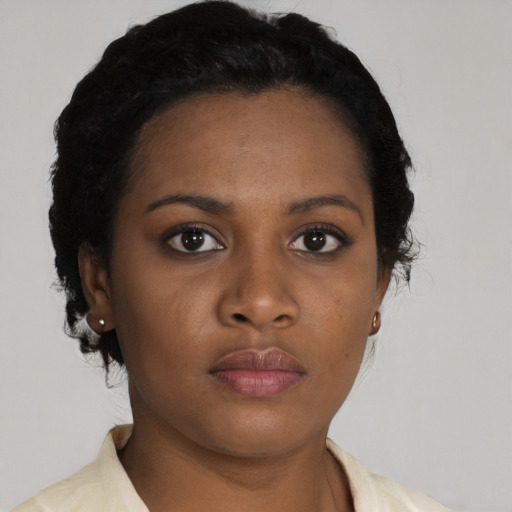 Neutral latino young-adult female with short  black hair and brown eyes