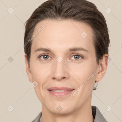 Joyful white adult female with short  brown hair and brown eyes