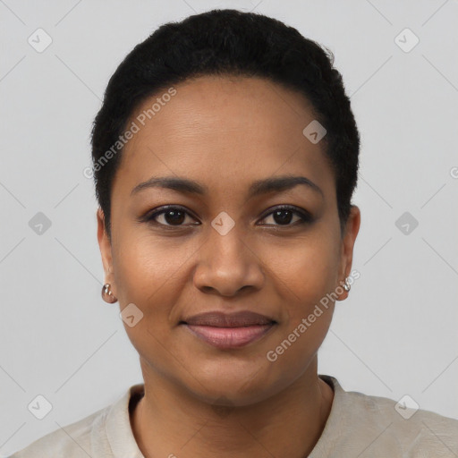 Joyful black young-adult female with short  black hair and brown eyes