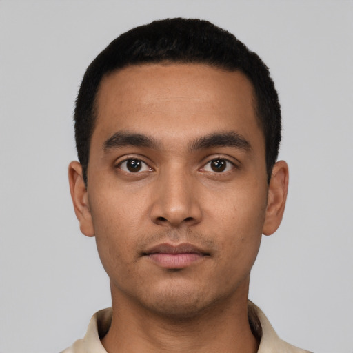 Neutral latino young-adult male with short  black hair and brown eyes