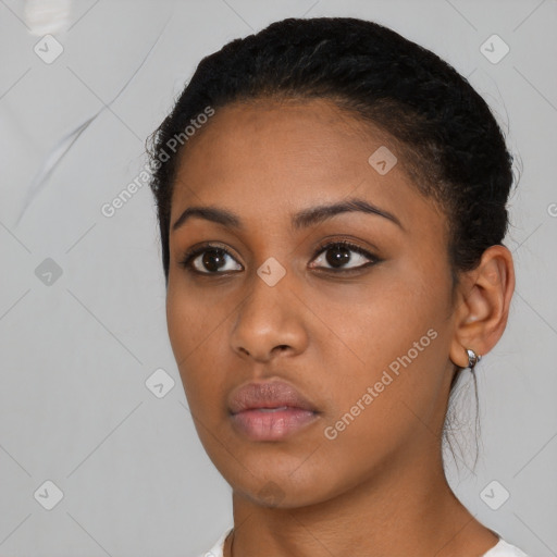 Neutral black young-adult female with short  brown hair and brown eyes