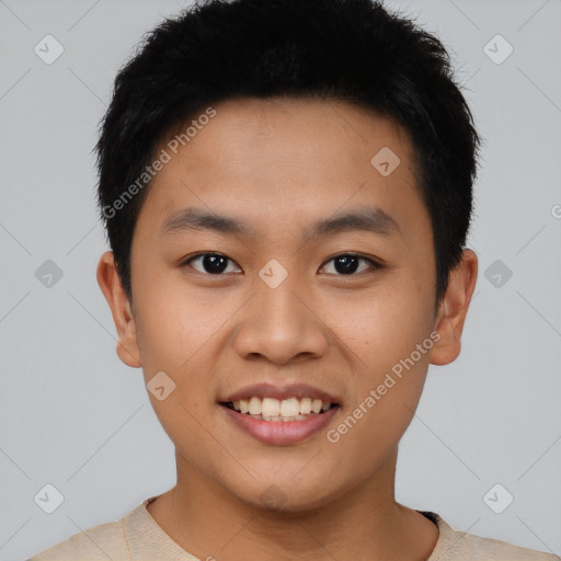 Joyful asian young-adult male with short  black hair and brown eyes