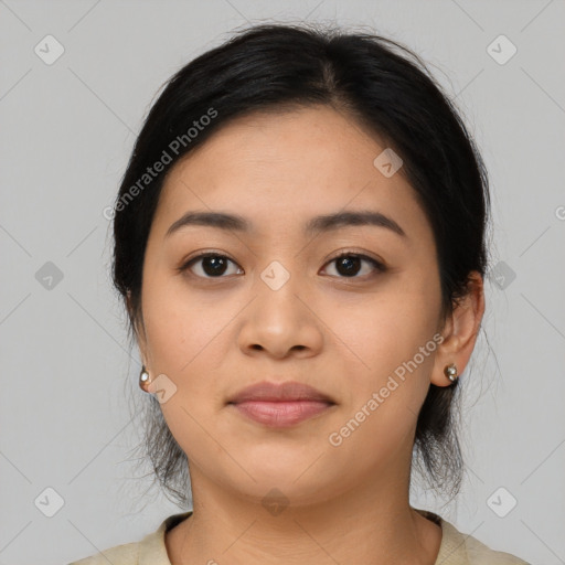 Joyful latino young-adult female with medium  black hair and brown eyes