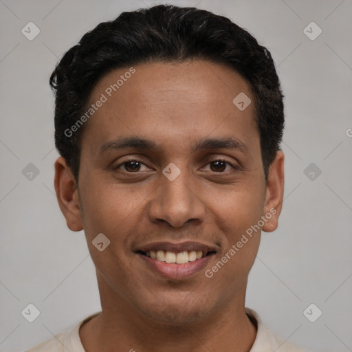 Joyful latino young-adult male with short  black hair and brown eyes