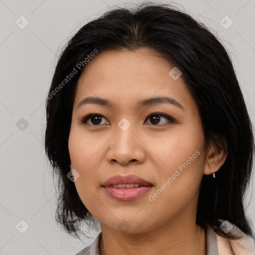 Joyful asian young-adult female with medium  black hair and brown eyes