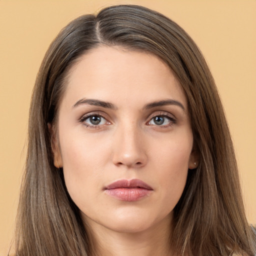 Neutral white young-adult female with long  brown hair and brown eyes