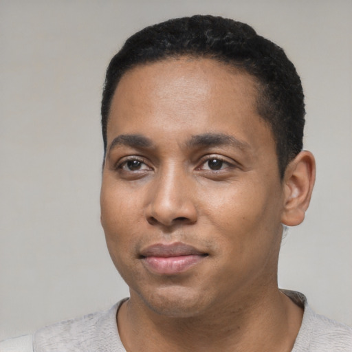 Neutral black young-adult male with short  black hair and brown eyes