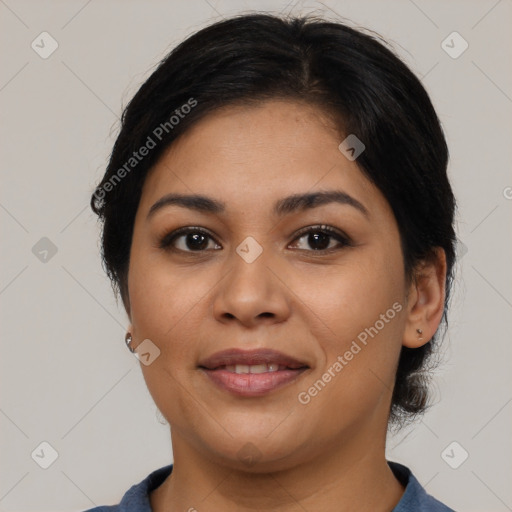 Joyful latino young-adult female with medium  brown hair and brown eyes