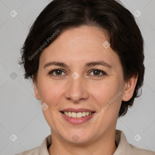 Joyful white adult female with medium  brown hair and brown eyes