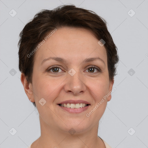 Joyful white adult female with short  brown hair and brown eyes