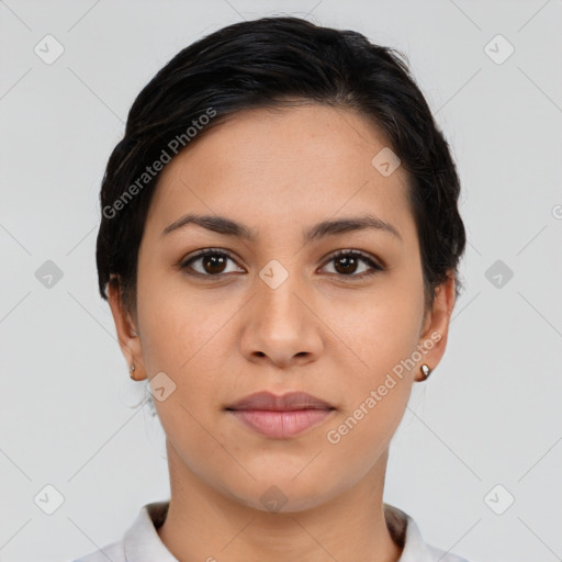 Joyful latino young-adult female with short  brown hair and brown eyes