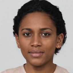 Neutral black young-adult female with short  black hair and brown eyes