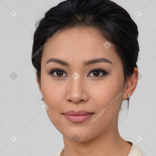 Joyful asian young-adult female with short  brown hair and brown eyes