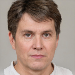 Neutral white adult male with short  brown hair and grey eyes