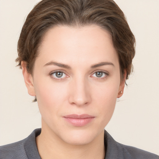 Neutral white young-adult female with short  brown hair and brown eyes