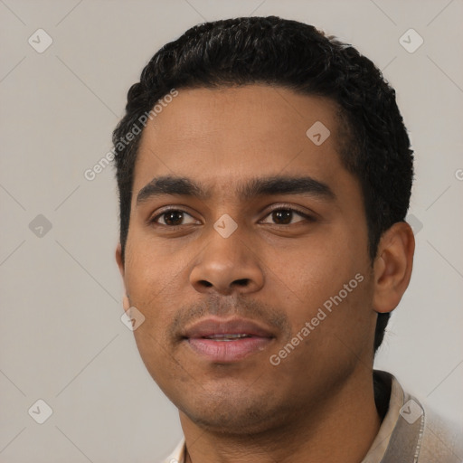 Neutral latino young-adult male with short  black hair and brown eyes