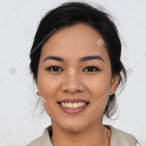 Joyful asian young-adult female with medium  black hair and brown eyes