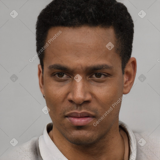 Neutral latino young-adult male with short  black hair and brown eyes