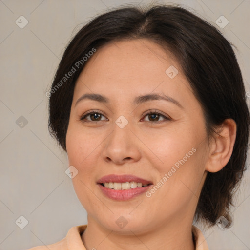 Joyful white adult female with medium  brown hair and brown eyes