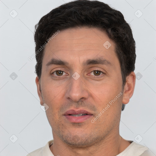 Neutral white adult male with short  brown hair and brown eyes