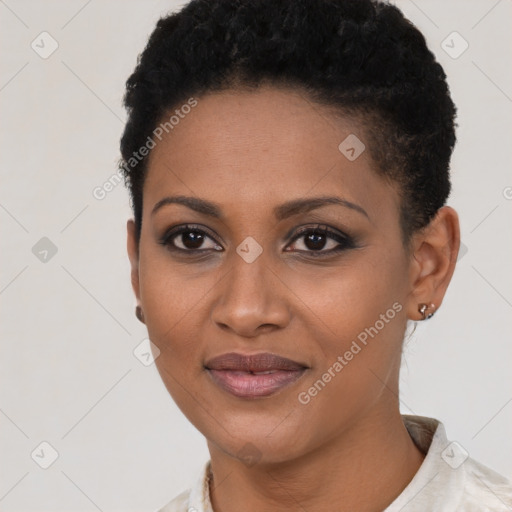 Joyful black young-adult female with short  brown hair and brown eyes