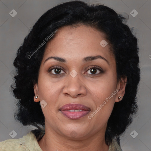 Joyful black adult female with medium  brown hair and brown eyes