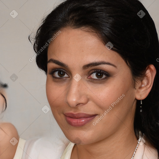 Joyful latino young-adult female with medium  brown hair and brown eyes