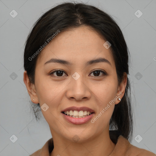 Joyful asian young-adult female with medium  brown hair and brown eyes