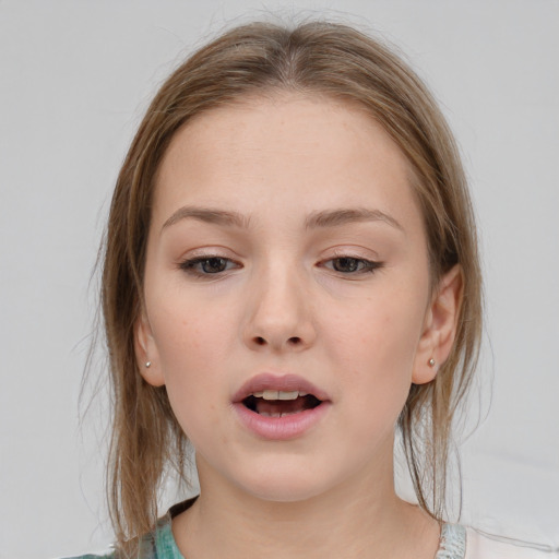 Neutral white young-adult female with medium  brown hair and grey eyes