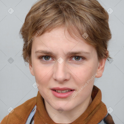 Joyful white young-adult female with short  brown hair and grey eyes