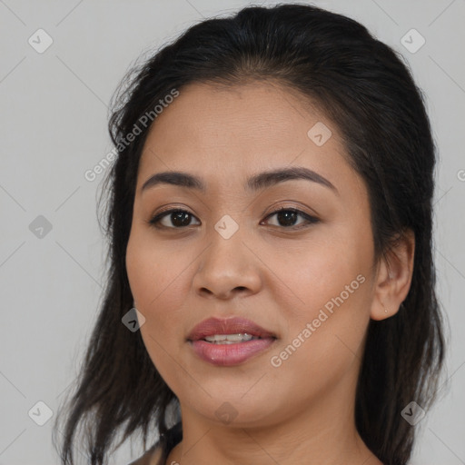 Joyful asian young-adult female with long  brown hair and brown eyes